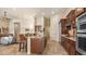 Open-concept living area with seamless flow, kitchen access, and stylish furnishings perfect for entertaining at 1903 N Lynch --, Mesa, AZ 85207
