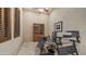 Bright office with a glass desk, storage and neutral walls at 1903 N Lynch --, Mesa, AZ 85207