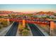 Aerial view of roadway overpass with desert mountains and landscaping at 1903 N Lynch --, Mesa, AZ 85207