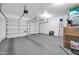 Clean, well-lit garage with ample space for multiple vehicles and storage at 19815 N 49Th Ave, Glendale, AZ 85308