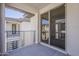 Exterior view of balcony with black metal railings and patio door entry at 2121 W Sonoran Desert Dr # 21, Phoenix, AZ 85085