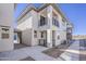 Modern two-story home featuring clean architectural lines and a private balcony at 2121 W Sonoran Desert Dr # 21, Phoenix, AZ 85085