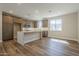 Open kitchen features wood cabinets, stone countertops, and recessed lighting at 2121 W Sonoran Desert Dr # 21, Phoenix, AZ 85085