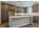 Modern kitchen with stainless steel appliances, and dark wood cabinets at 2121 W Sonoran Desert Dr # 21, Phoenix, AZ 85085