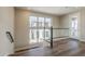 Second-floor landing with large windows at 2121 W Sonoran Desert Dr # 21, Phoenix, AZ 85085