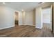 Open concept living area with wood floors, neutral walls, and recessed lighting at 2121 W Sonoran Desert Dr # 21, Phoenix, AZ 85085