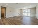 Open loft area with wood floors and a modern railing at 2121 W Sonoran Desert Dr # 21, Phoenix, AZ 85085