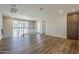 Bright loft area with wood floors, railing, and recessed lighting at 2121 W Sonoran Desert Dr # 21, Phoenix, AZ 85085