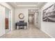 Bright entryway with decorative accents and tile flooring. Entry is illuminated by recessed lighting at 2167 W Ethan Ct, San Tan Valley, AZ 85144