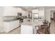 Well-equipped kitchen with stainless steel appliances, granite countertops, and ample cabinet space at 2167 W Ethan Ct, San Tan Valley, AZ 85144