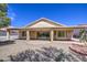Home featuring a covered patio, rock landscaping, and blue sky above at 2375 E Fiesta Dr, Casa Grande, AZ 85194