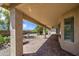 A spacious covered patio with brick flooring offers an inviting outdoor living space at 2375 E Fiesta Dr, Casa Grande, AZ 85194