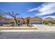 Inviting single-story home with a well-maintained front yard and a spacious driveway at 2375 E Fiesta Dr, Casa Grande, AZ 85194