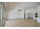 Bright and open living room with tile flooring, ceiling fan, and ample natural light at 2375 E Fiesta Dr, Casa Grande, AZ 85194