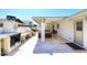 A backyard outdoor kitchen is viewed from the covered patio with an outdoor living space at 2808 E Lupine Ave, Phoenix, AZ 85028