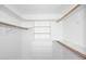 This closet has wooden hanging bars, shelves and drawers at 2808 E Lupine Ave, Phoenix, AZ 85028