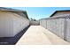 The concrete driveway runs alongside the white stucco wall at 2808 E Lupine Ave, Phoenix, AZ 85028