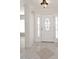 A bright foyer with decorative tile flooring and sidelight windows at 2808 E Lupine Ave, Phoenix, AZ 85028