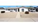 Charming single-story home featuring low-maintenance desert landscaping and a convenient covered carport at 2808 E Lupine Ave, Phoenix, AZ 85028