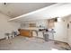 Clean garage interior with storage, shelving and concrete flooring at 2808 E Lupine Ave, Phoenix, AZ 85028