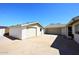 Two separate garages with individual doors and spacious concrete driveways at 2808 E Lupine Ave, Phoenix, AZ 85028