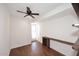 Living room with hardwood floors, ceiling fan, and wooden accents at 2808 E Lupine Ave, Phoenix, AZ 85028