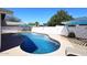 Backyard pool view featuring cool clear water and sun bathing deck area at 2808 E Lupine Ave, Phoenix, AZ 85028