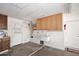 The utility room includes built-in cabinets and a utility sink at 2808 E Lupine Ave, Phoenix, AZ 85028