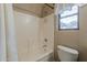 Bathroom with a tub, shower, and toilet at 29322 N Red Finch Dr, San Tan Valley, AZ 85143