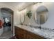 Bathroom featuring double sinks, granite counters, and updated fixtures at 29322 N Red Finch Dr, San Tan Valley, AZ 85143