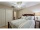 Comfortable bedroom featuring a ceiling fan and closet at 29322 N Red Finch Dr, San Tan Valley, AZ 85143