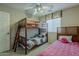 Bedroom with two bunk beds at 29322 N Red Finch Dr, San Tan Valley, AZ 85143