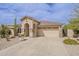 Attractive single-story home featuring a two-car garage, desert landscaping and a tile roof at 29322 N Red Finch Dr, San Tan Valley, AZ 85143