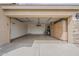 Spacious garage with ample storage and epoxy floors at 29322 N Red Finch Dr, San Tan Valley, AZ 85143