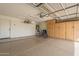 Well-organized garage with storage cabinets and epoxy floor at 29322 N Red Finch Dr, San Tan Valley, AZ 85143
