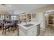 Open kitchen area seamlessly connects to the dining and living spaces, creating a welcoming atmosphere at 29322 N Red Finch Dr, San Tan Valley, AZ 85143