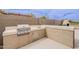 Outdoor kitchen features built-in grill, sink, and counter space perfect for entertaining outdoors at 29322 N Red Finch Dr, San Tan Valley, AZ 85143