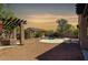 Backyard showcasing built in barbeque, lush greenery and a sparkling pool at 2982 E Boston St, Gilbert, AZ 85295