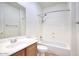 Clean bathroom featuring tub and shower combination with a vanity and mirror at 2982 E Boston St, Gilbert, AZ 85295