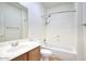 Bright bathroom featuring a shower and tub combination with a white sink and vanity at 2982 E Boston St, Gilbert, AZ 85295