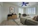 Bright bedroom featuring white walls, plush carpeting, and a ceiling fan at 2982 E Boston St, Gilbert, AZ 85295