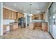 Spacious kitchen featuring stainless steel appliances, island, and ample counter space at 2982 E Boston St, Gilbert, AZ 85295
