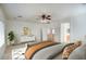 Spacious main bedroom with white walls, a ceiling fan and a walk-in closet entrance at 2982 E Boston St, Gilbert, AZ 85295