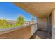 Balcony with views of the surrounding neighborhood, showcasing a blend of residential and commercial buildings at 3030 N Hayden Rd # 16, Scottsdale, AZ 85251