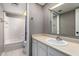 Cozy bathroom featuring a shower and tub combination, neutral gray walls, and a vanity with a sink at 3030 N Hayden Rd # 16, Scottsdale, AZ 85251