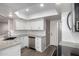 Modern kitchen with white cabinets and granite countertops at 3030 N Hayden Rd # 16, Scottsdale, AZ 85251