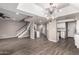 Open living area with stairs, wine cooler, and kitchen at 3030 N Hayden Rd # 16, Scottsdale, AZ 85251