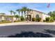 Community center with palm trees, lush green landscaping and an American flag at 3343 E Ivanhoe St, Gilbert, AZ 85295