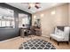 Well-lit interior showcasing a desk area, plantation shutters and neutral paint at 3343 E Ivanhoe St, Gilbert, AZ 85295