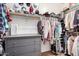 Spacious walk-in closet with clothes racks, shelving, and a gray dresser at 3343 E Ivanhoe St, Gilbert, AZ 85295